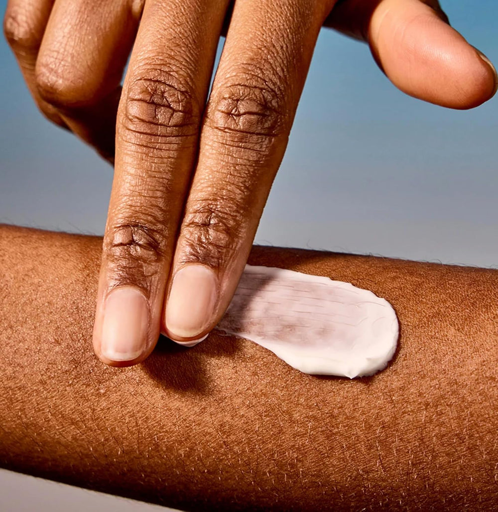 Acure Day Cream with argan oil on a soft skincare setup for radiance.