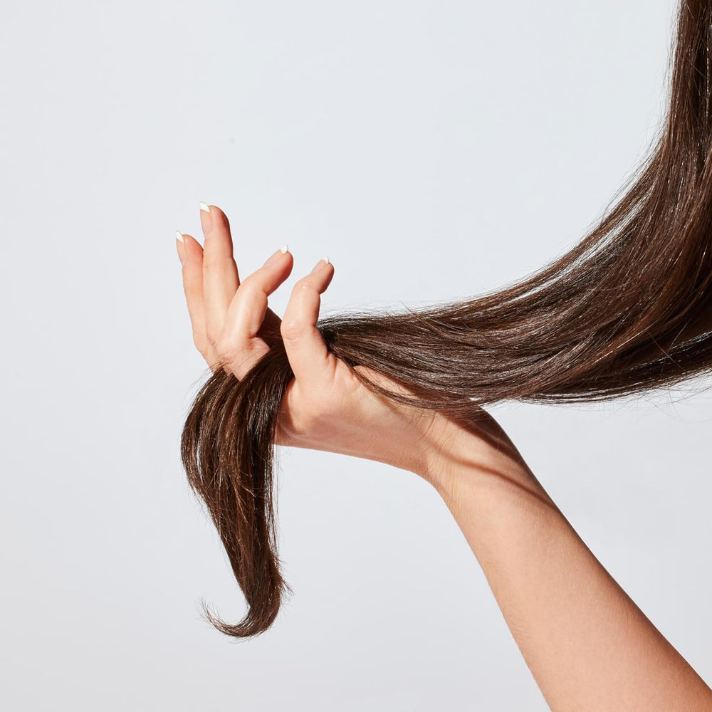 Acure Bonding Hair Serum close-up highlighting silky texture and lightweight feel
