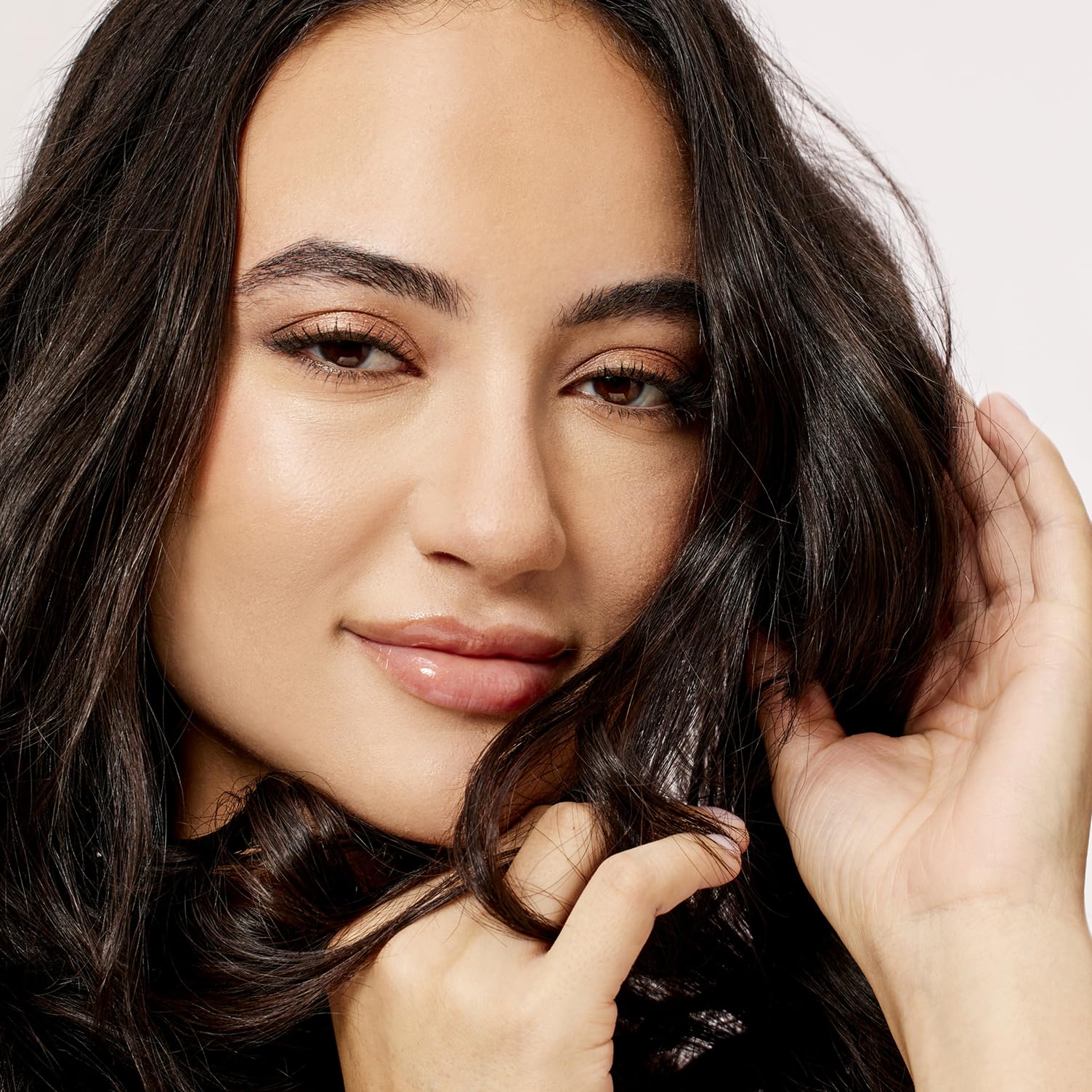 Acure Bonding Leave-In on curly hair demonstrates improved manageability and reduced frizz.