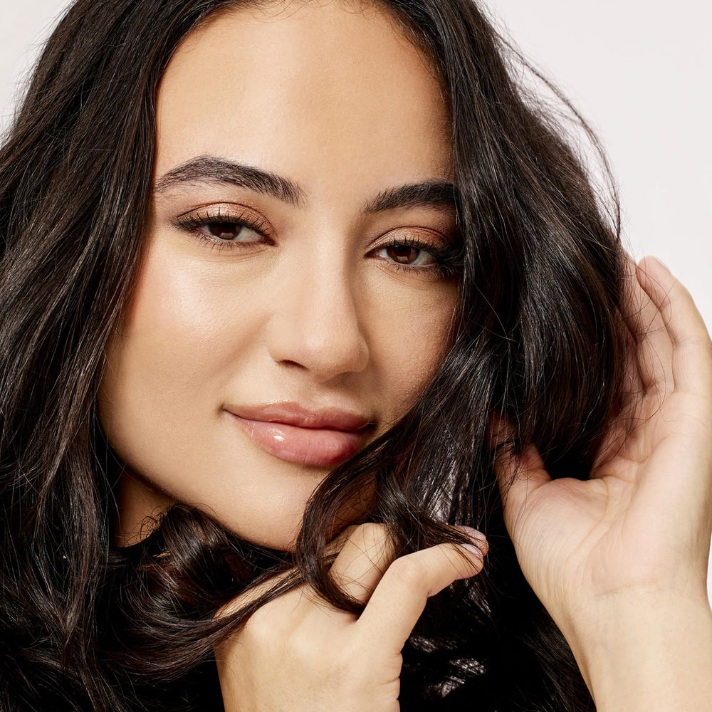Acure Bonding Leave-In on curly hair demonstrates improved manageability and reduced frizz.