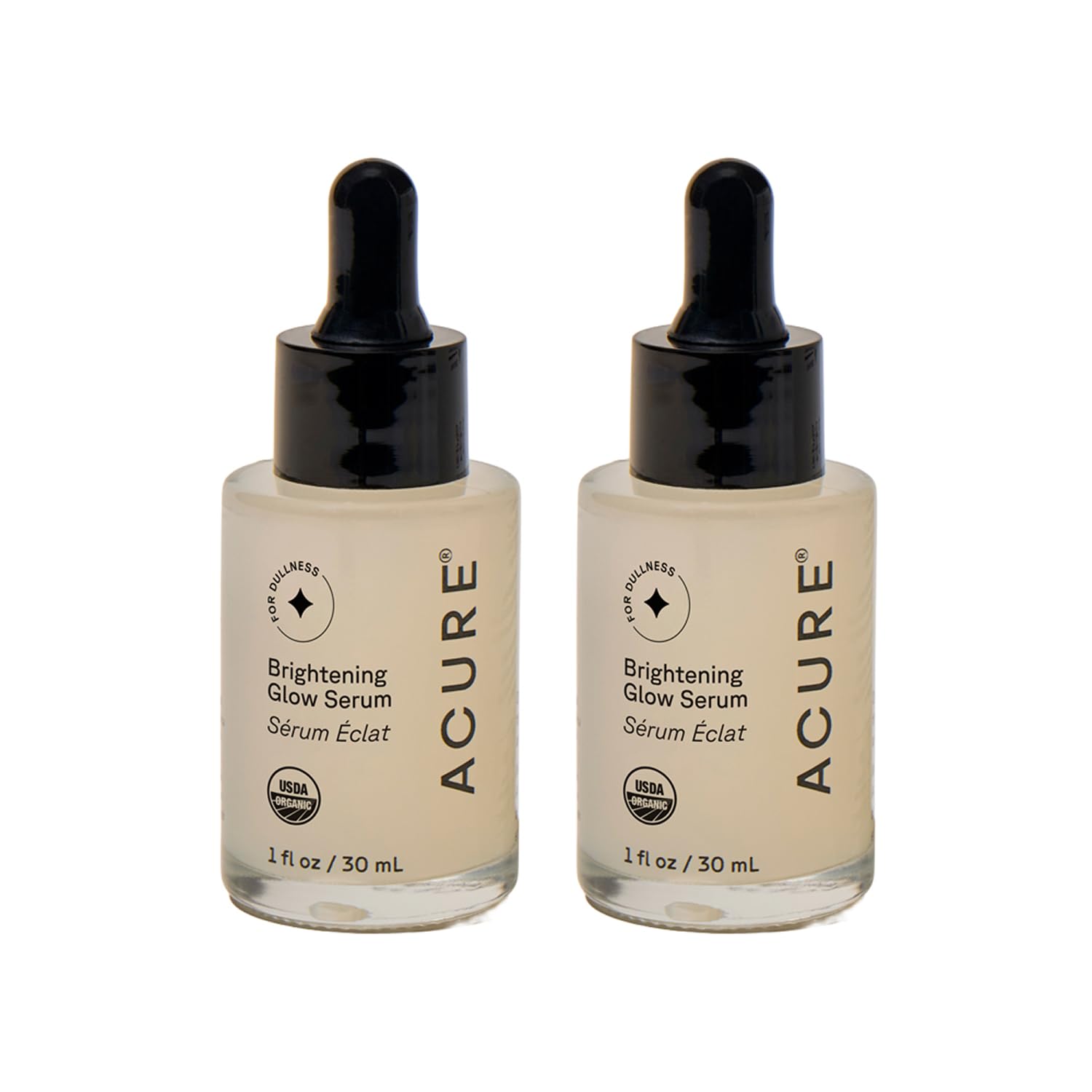 Acure Brightening Glow Serum bottle bathed in light for radiant, healthy-looking skin