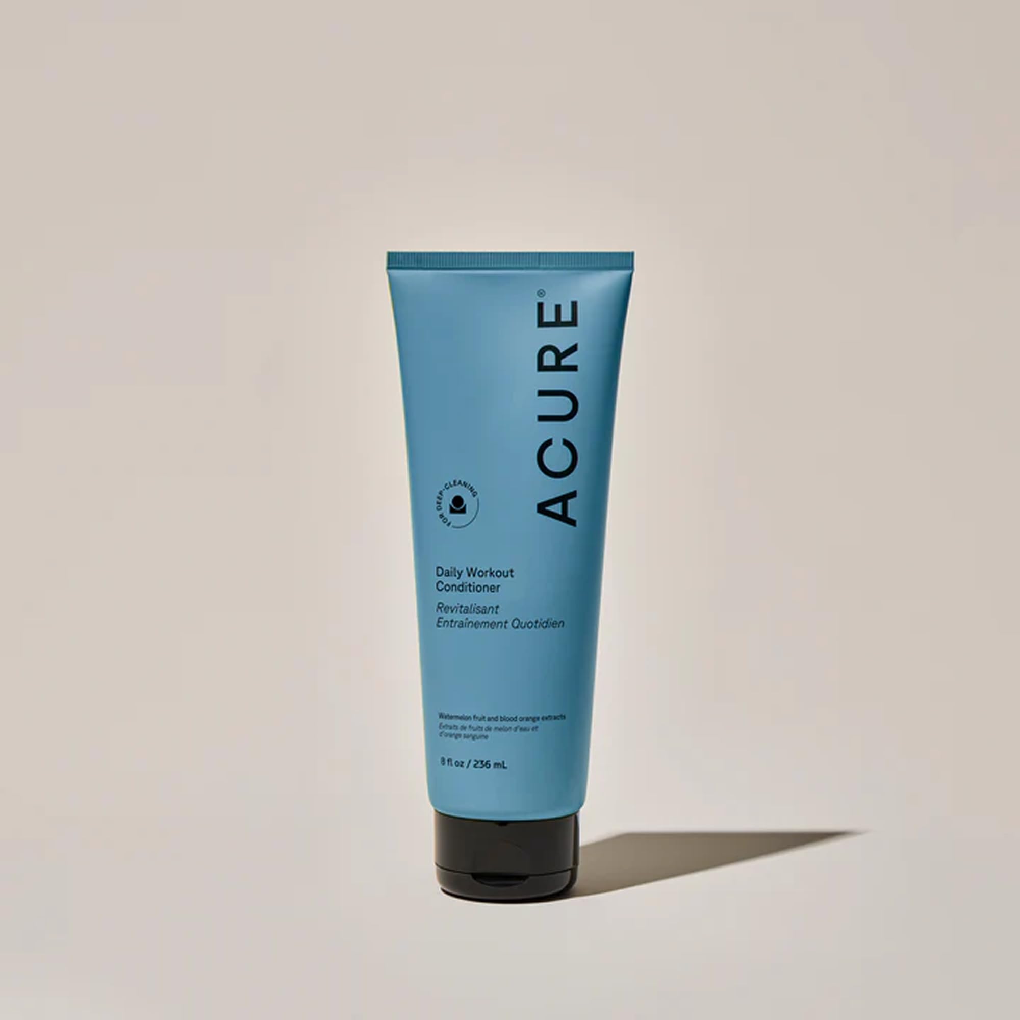 Acure Daily Workout Watermelon Conditioner application on mid-length to ends for nourishment.