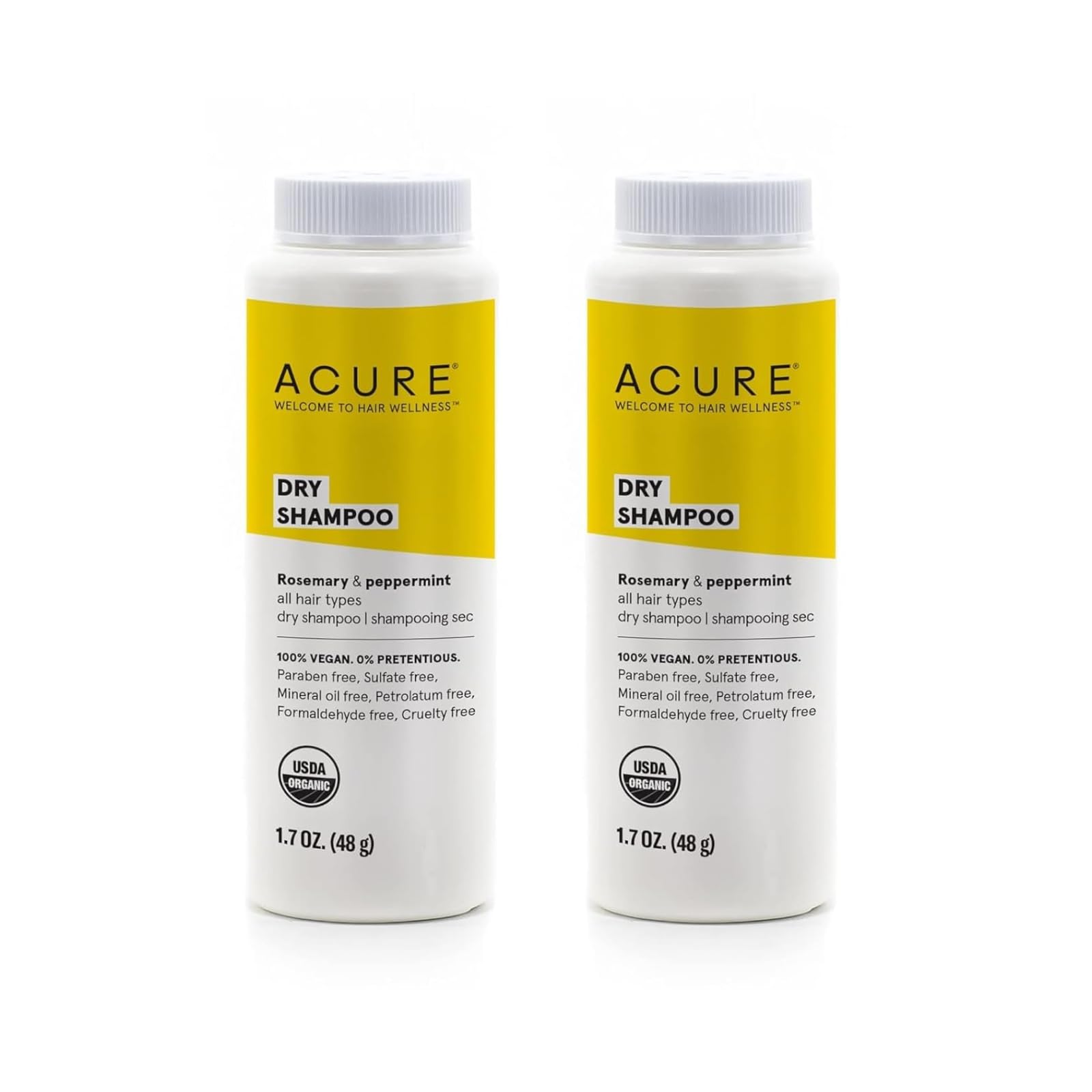 Acure dry shampoo mini bottle cap close-up, highlighting travel-friendly packaging for on-the-go refresh