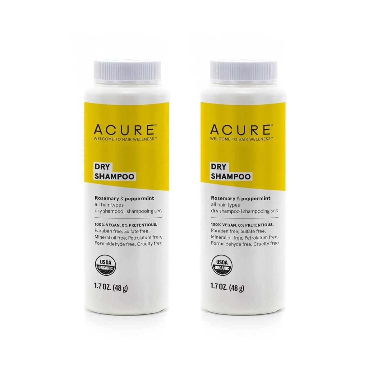 Acure dry shampoo mini bottle cap close-up, highlighting travel-friendly packaging for on-the-go refresh