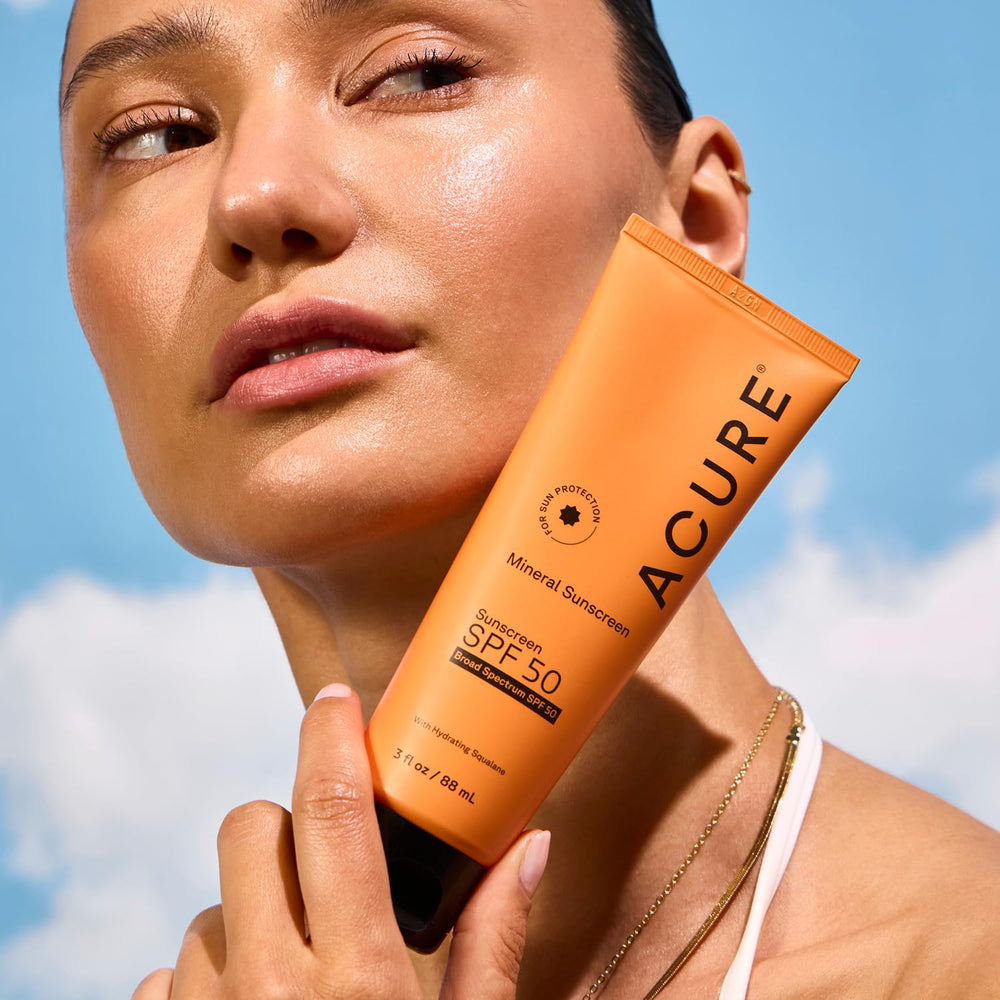 Acure Mineral Sunscreen SPF 50 travel size in a bag for outdoor activities