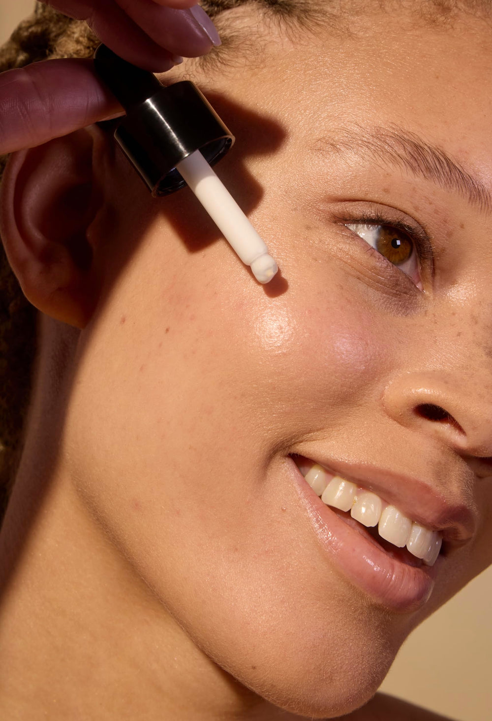 Acure Sun Serum Drops travel size bottle for on the go sun care.