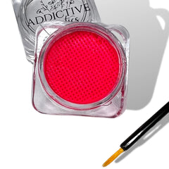 Addictive Cosmetics Water-activated eyeliner close-up showing vivid pigment