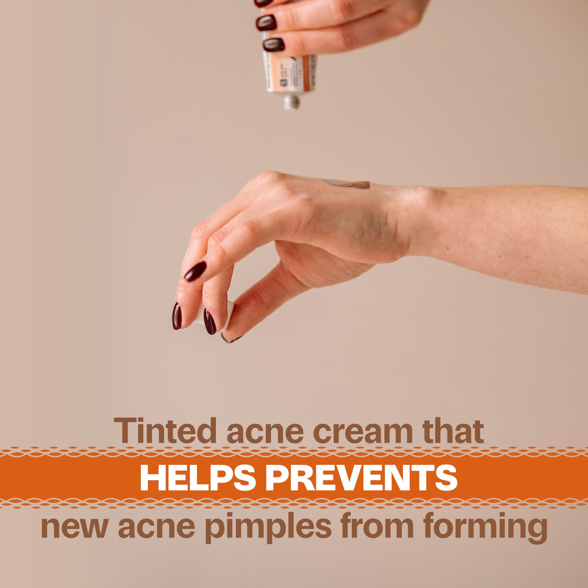 Adult Acnomel tinted cream swatch blending with skin for a natural look.
