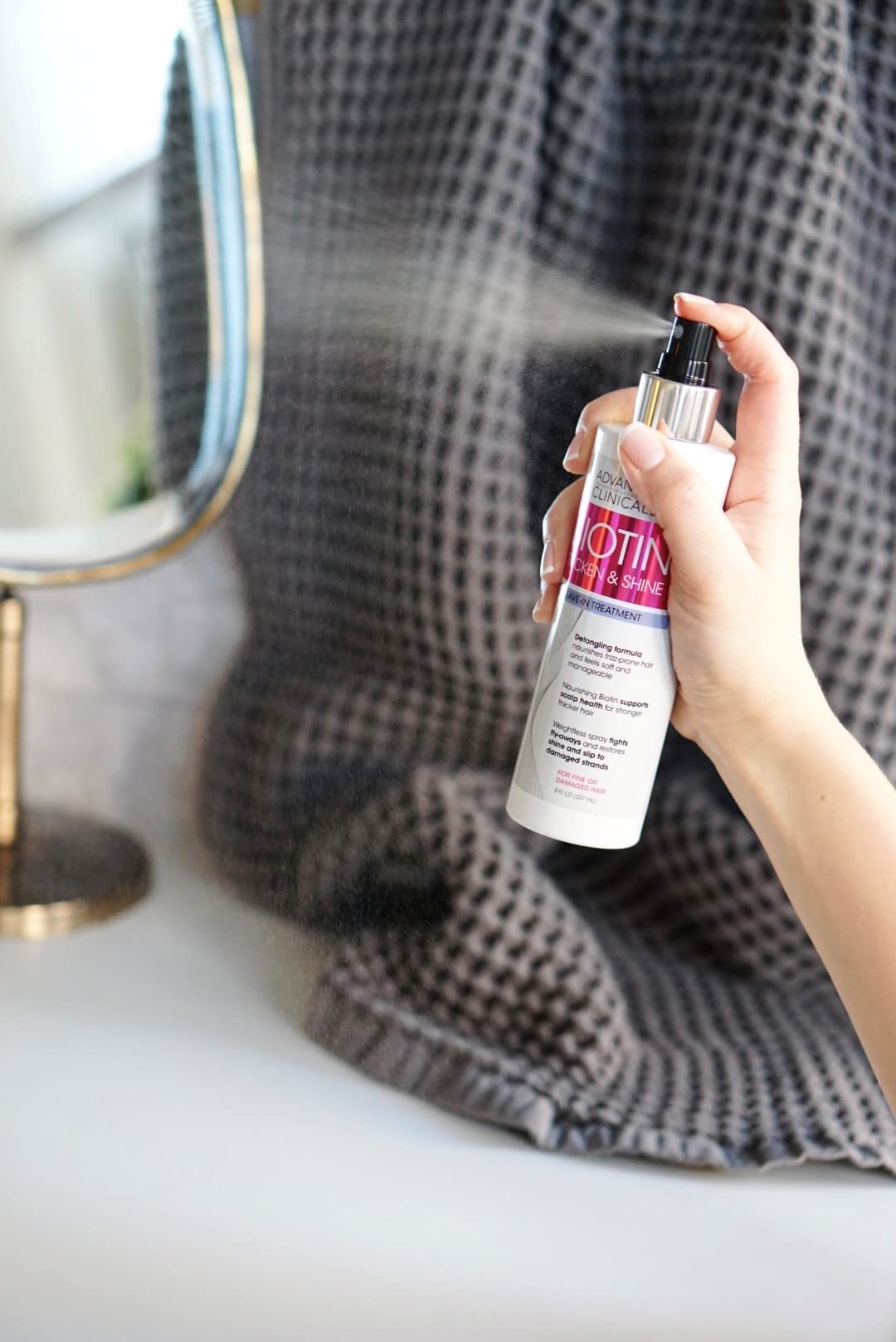 Advanced Clinicals Hair Spray bottle and mist capture color-treated hydration impact.