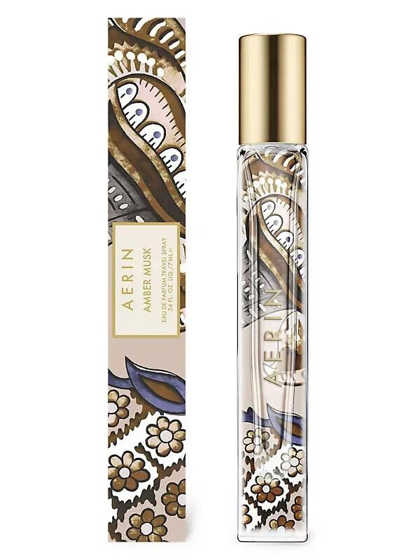 AERIN Amber Musk travel spray bottle, compact and portable for on-the-go fragrance.
