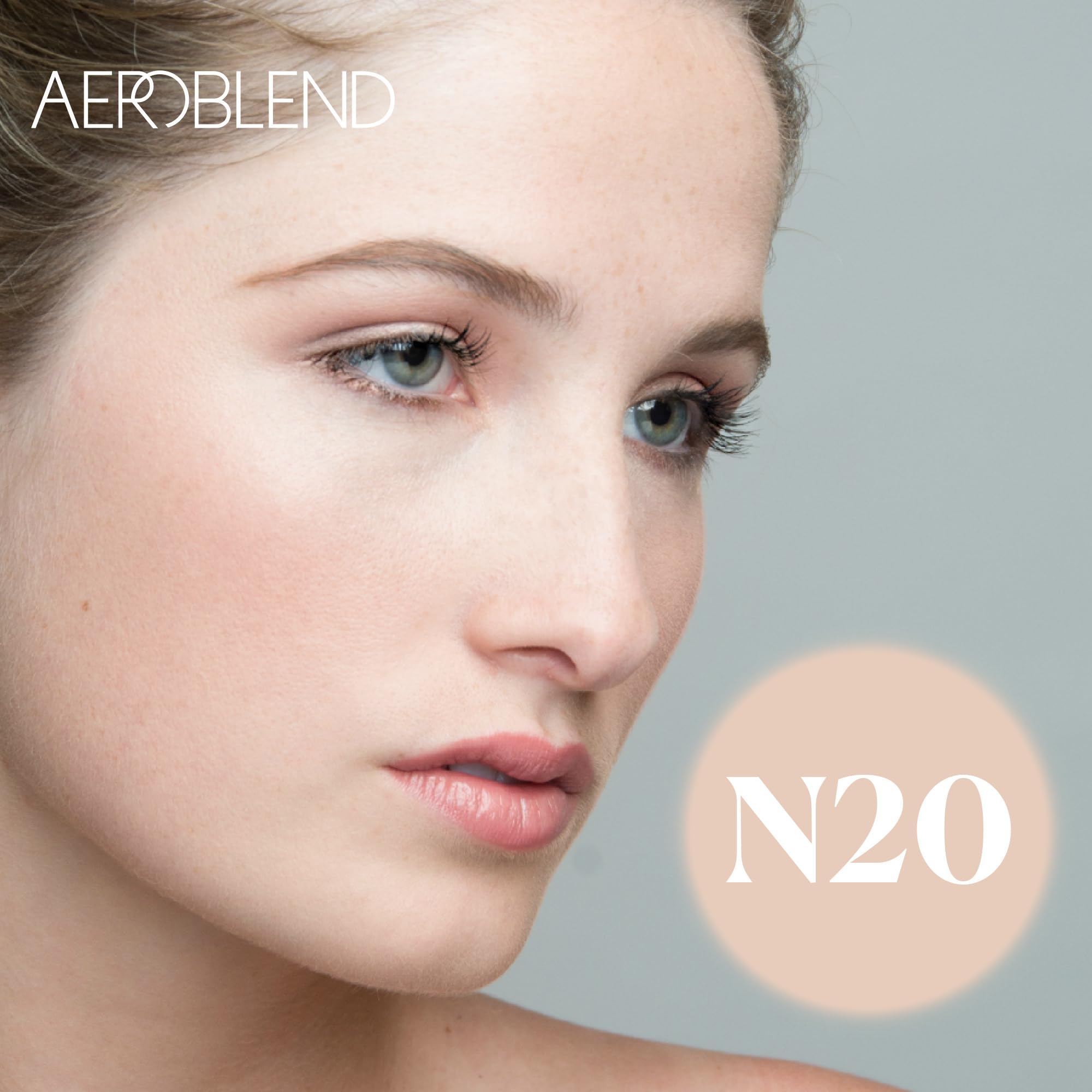 Airbrush in action delivering buildable coverage for a natural finish.