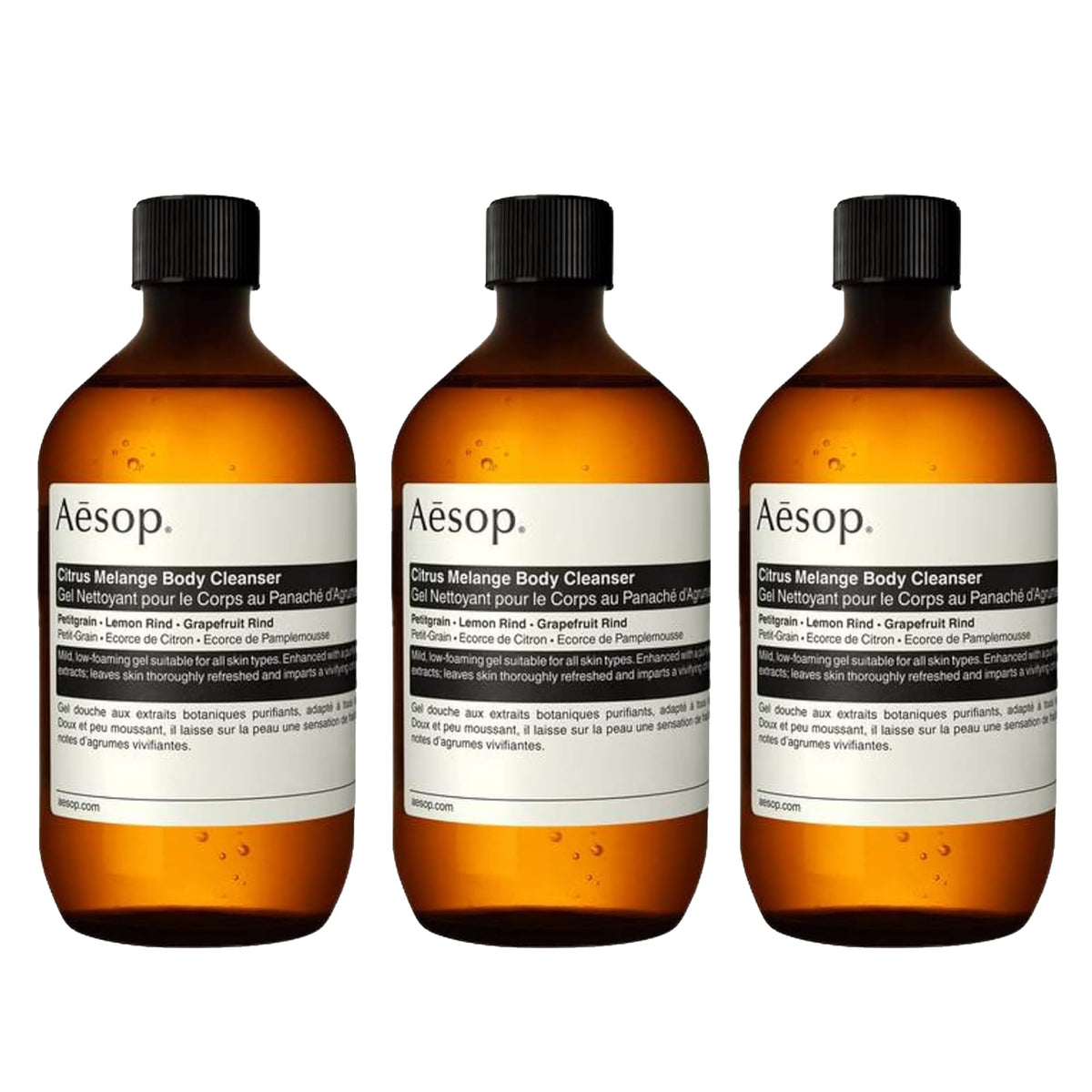 Aesop Citrus Melange Body Cleanser refill bottle being poured for a refreshing citrus cleanse.
