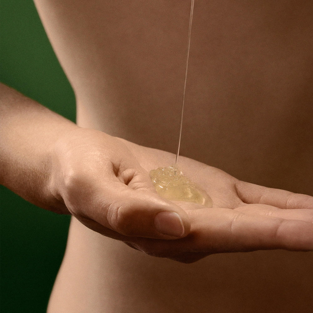 Aesop Geranium Leaf Body Cleanser texture closeup shows a refreshing gel that rinses clean.