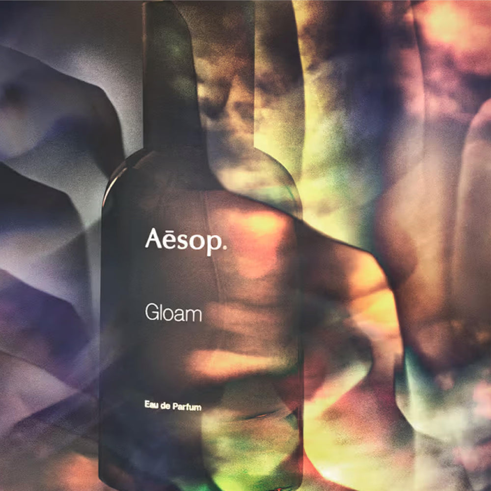 Aesop Gloam base with iris and patchouli delivers soft, powdery warmth that lingers.