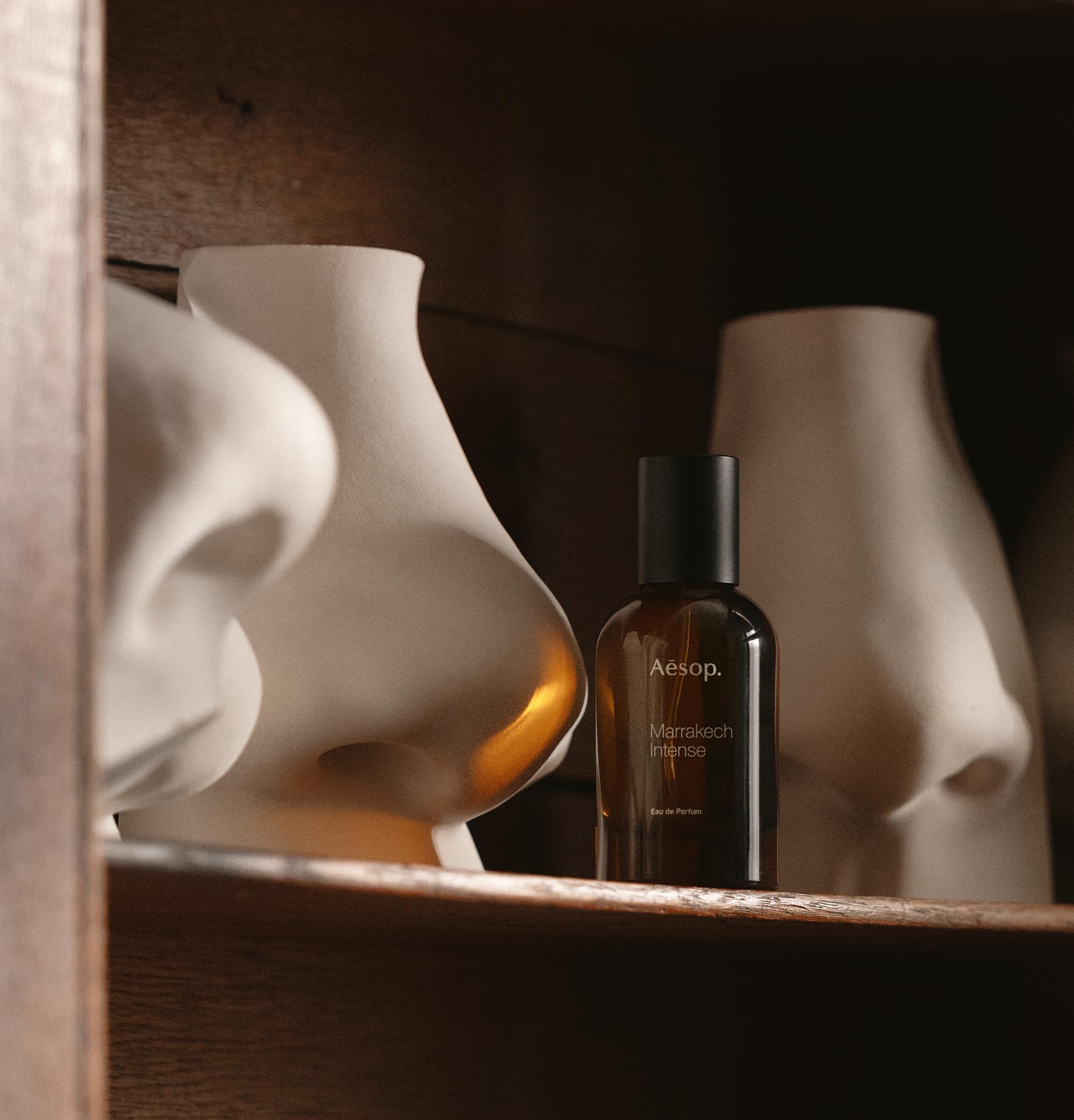 Aesop Marrakech Intense wood-notes illustration with warm cedar and sandalwood depth