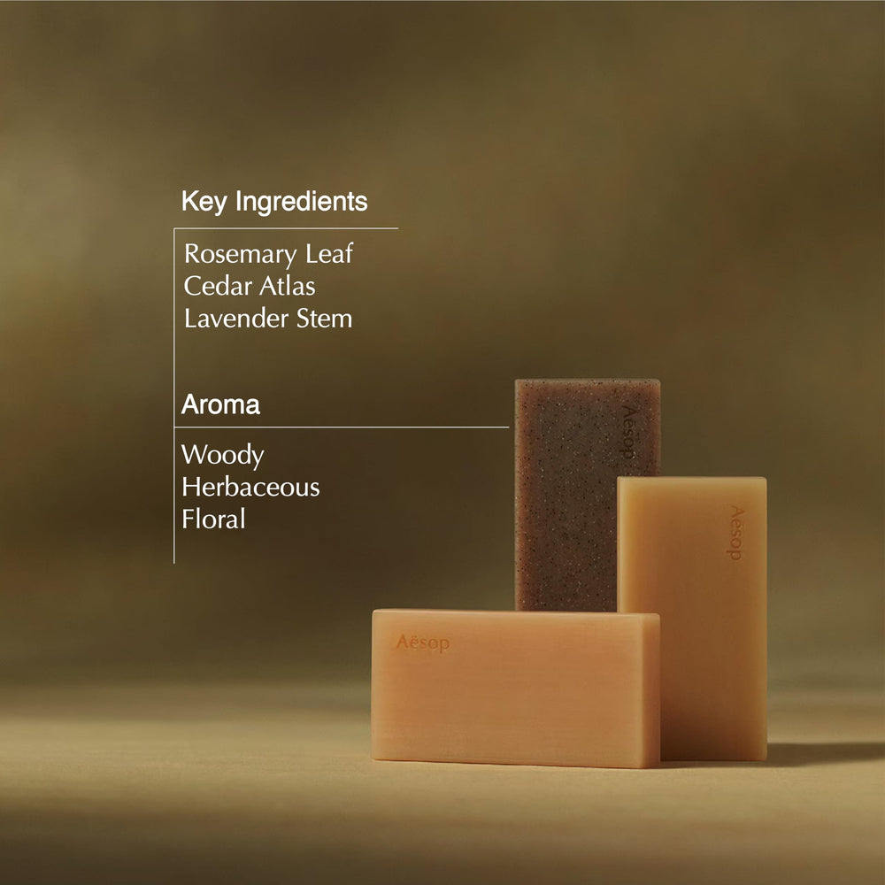 Aesop Nurture Bar Soap shown on damp skin for gentle cleansing.