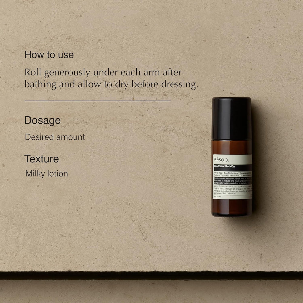 Aesop Roll-On applicator in use for quick underarm refresh.
