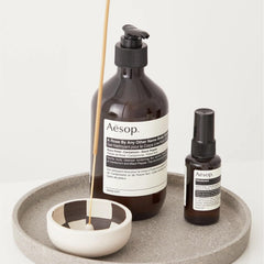 Aesop rose-petal oil close-up suggests a floral, soothing aroma.