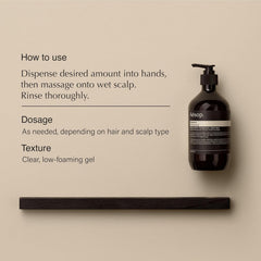 Aesop Shampoo bottle closeup highlights frankincense aroma for cleansing.