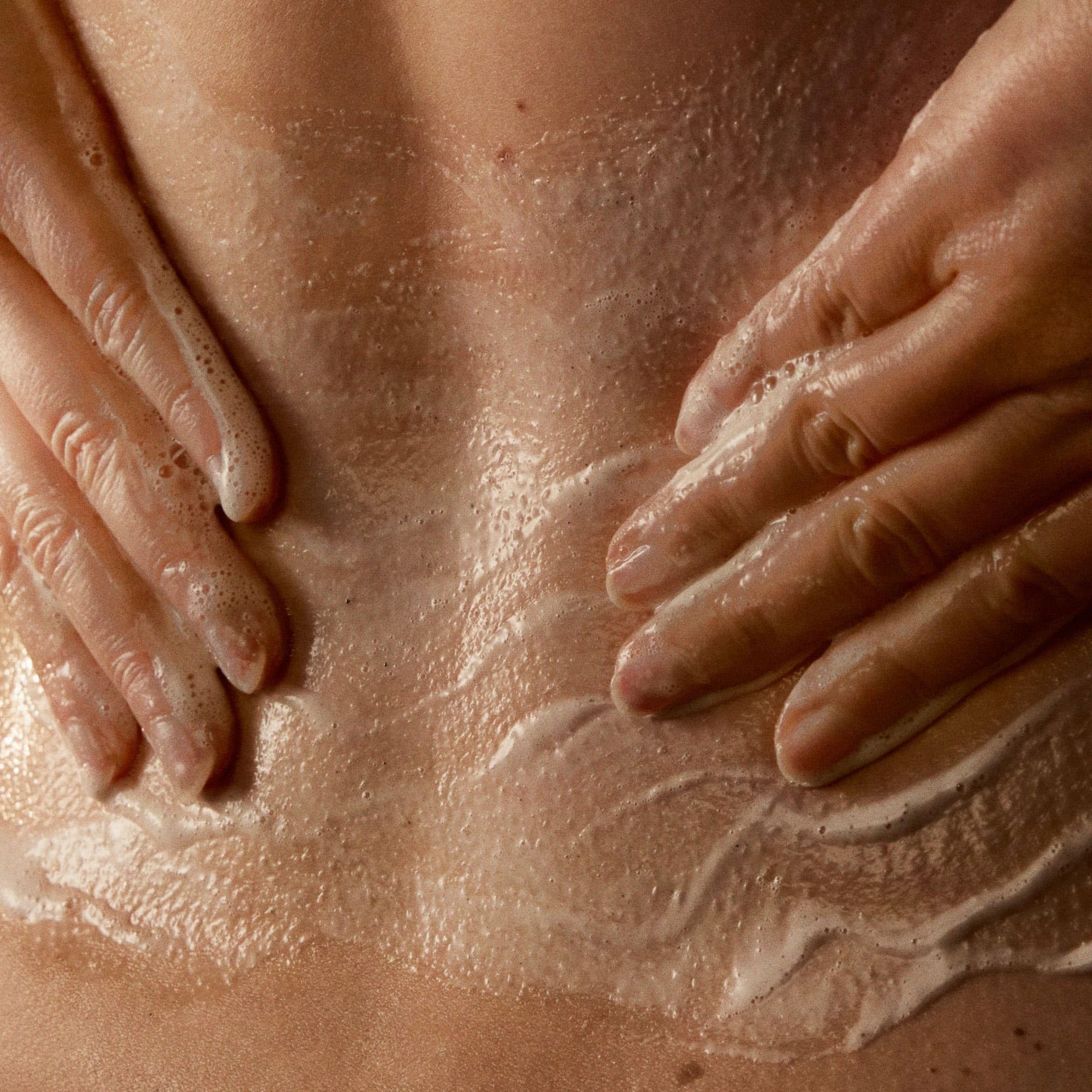 Aesop Shampoo texture closeup showing clear, low-foaming formula