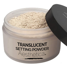 Aesthetica Translucent Setting Powder jar delivers a light, oil-absorbing finish for long wear.