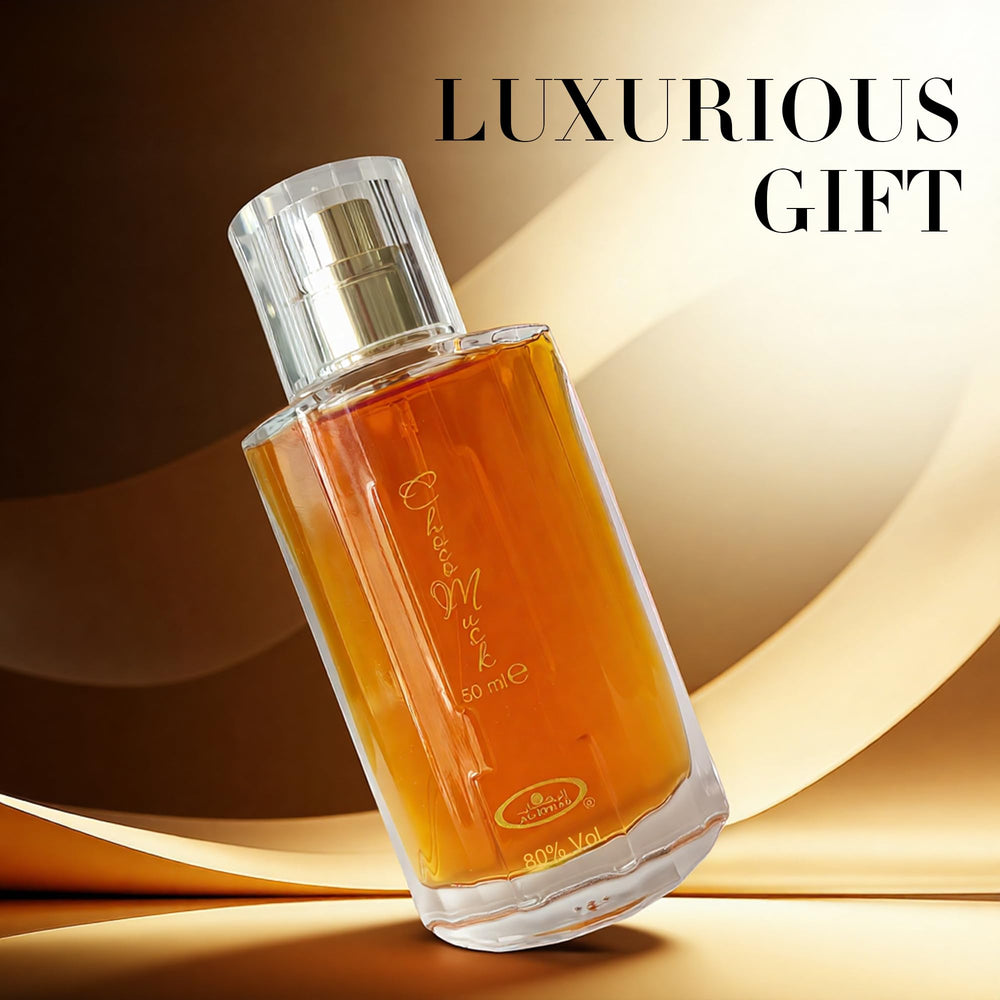 AFLUXE Choco Musk spray application on wrist, sample use.