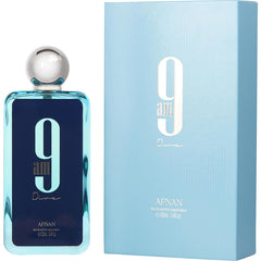 Afnan 9Am Dive bottle pour offers a fresh, fruity touch for daily wear