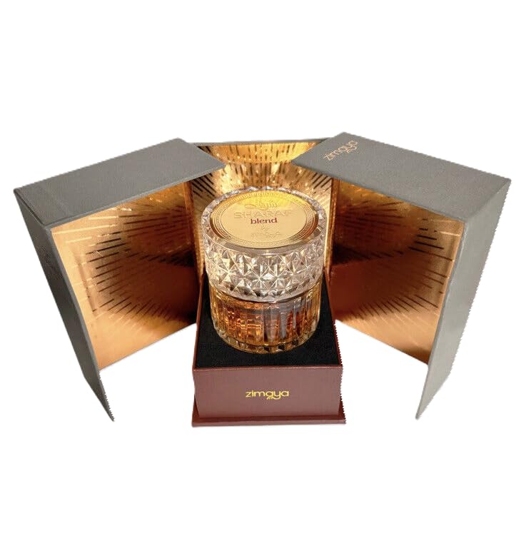 Afnan Macarena Sharaf Blend packaging box opens to reveal premium 3.4 oz EDP.