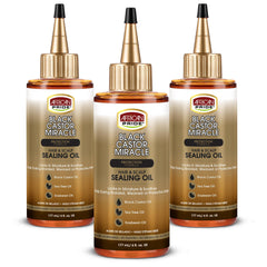 African Pride Black Castor Miracle bottle pour for targeted moisture application