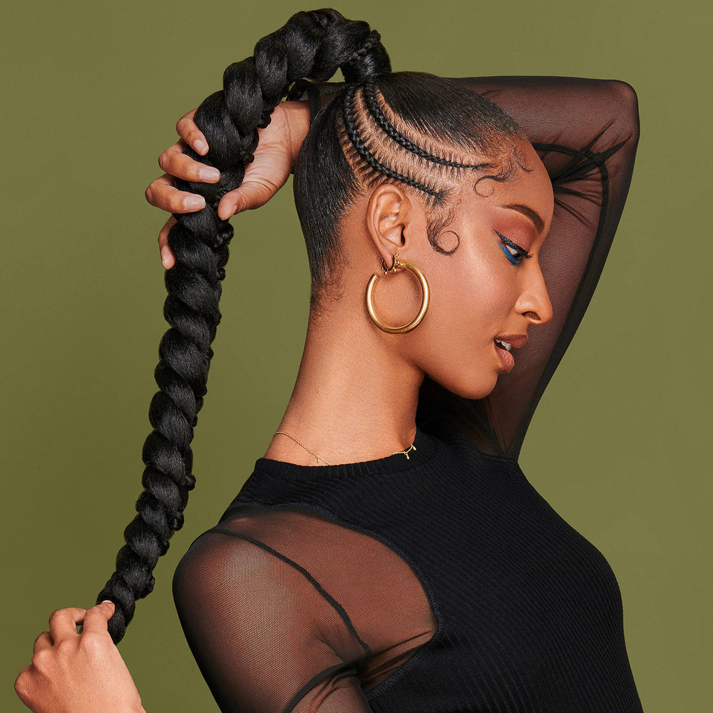 Ponytail with sleek edges using African Pride Olive Miracle.