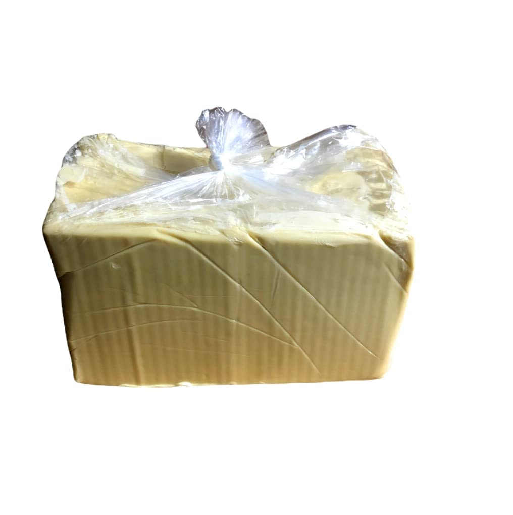 afrimports African Shea Butter being applied to hands; supports dry patches and cuticles.