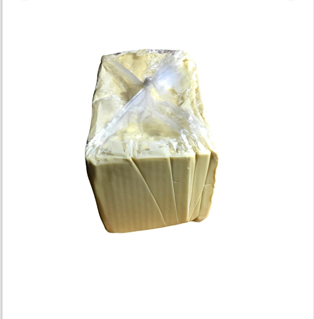 afrimports Shea Butter texture close-up; rich, creamy, quick-absorbing formula for nourishing skin.