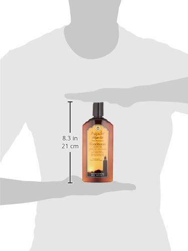 Agadir Argan Oil Daily Moisturizing Conditioner bottle on vanity for daily care.