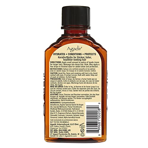 Agadir Argan Oil Hair Treatment label detail highlights vitamin E and fatty acids.