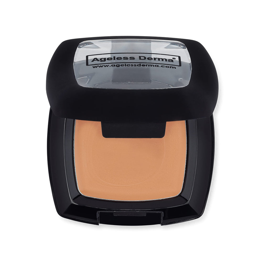Ageless Derma Camoufleur concealer bottle close-up showing creamy texture for smooth blending.