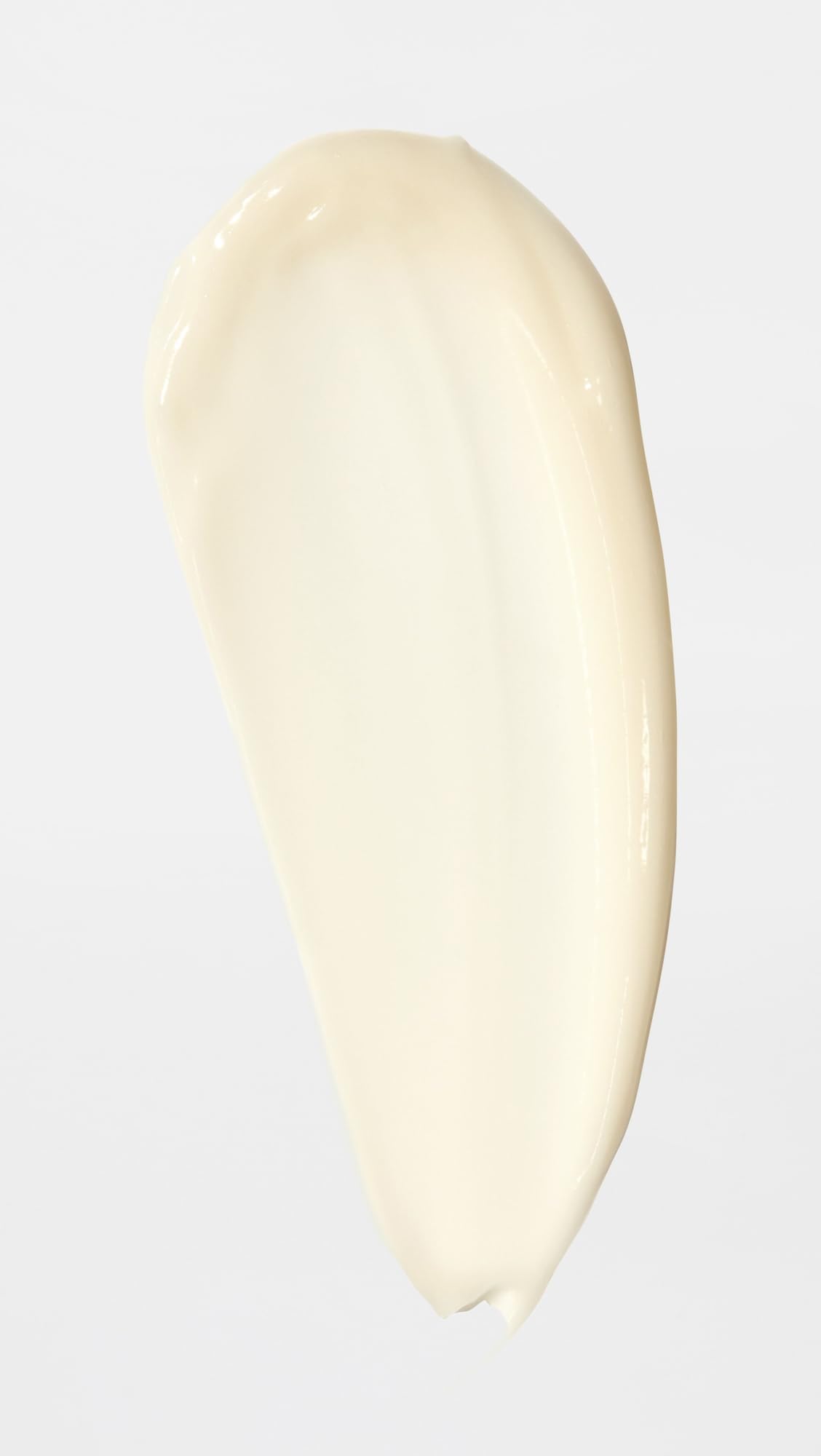 Agent Nateur Holi Glow Eye Serum applied under the eyes for hydration and a refreshed look.