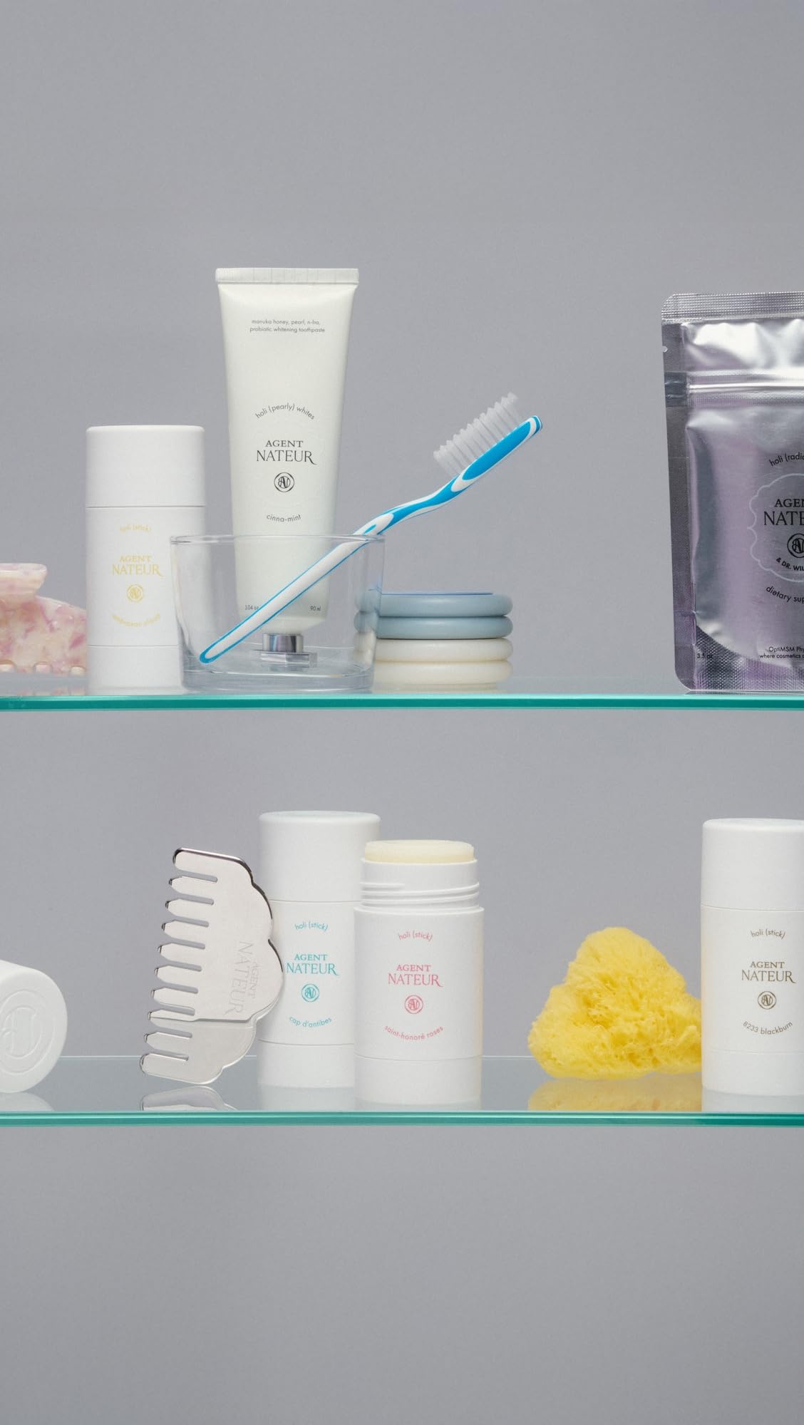 Agent Nateur holi stick packaging cap closeup emphasizes clean aluminum-free design.