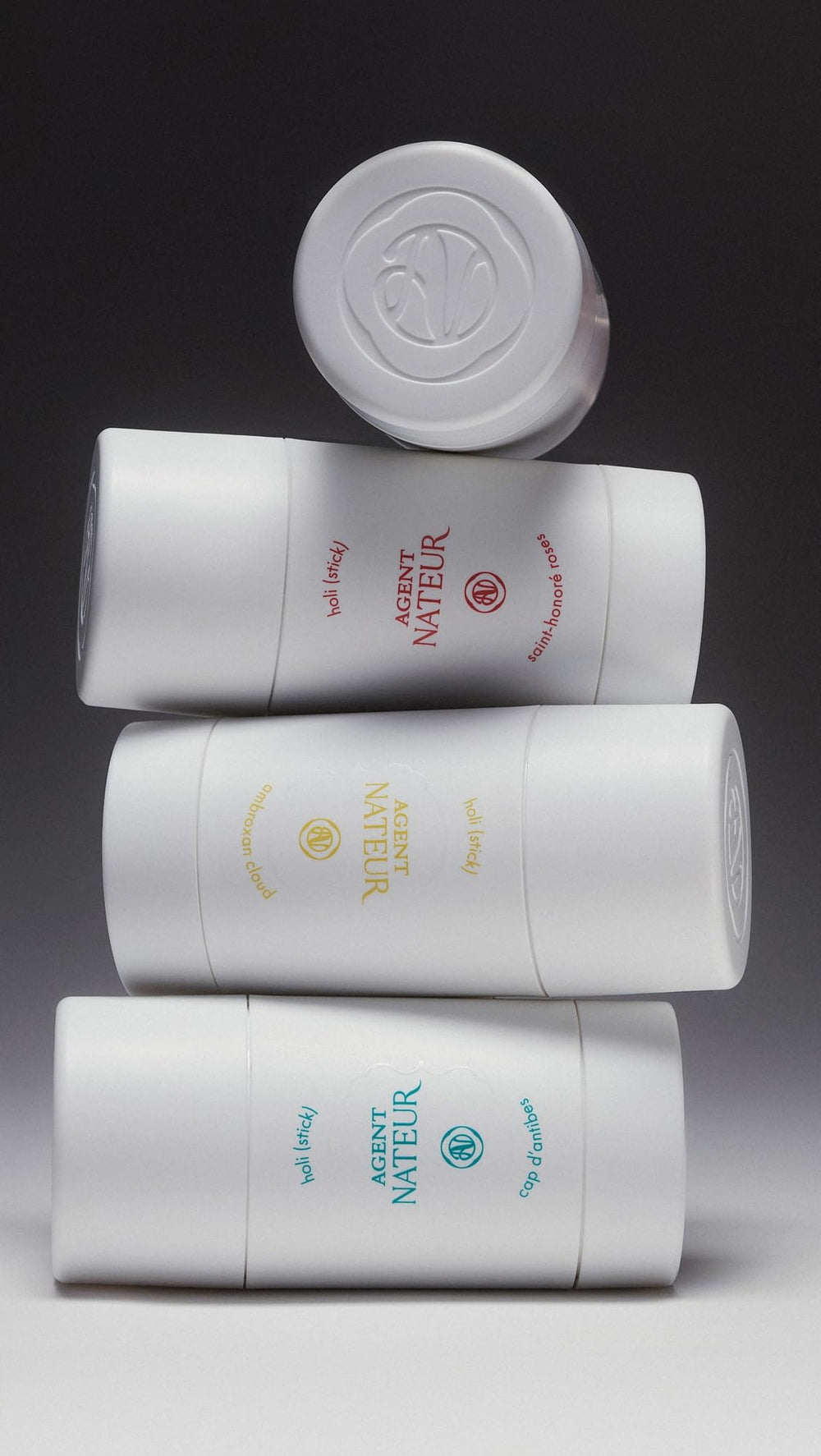 Agent Nateur holi stick skin contact application suggests soothing use and lasting scent.