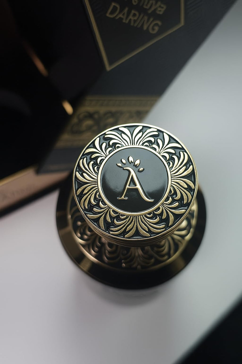AHUJA Daring geranium patchouli heart, masculine elegance revealed.