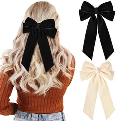 Aileam velvet bow close-up on clip with soft fabric and secure grip
