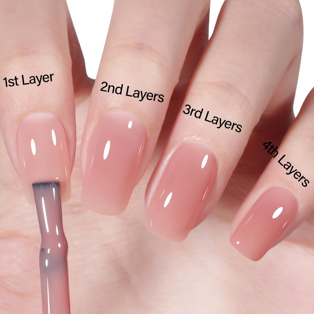 AILLSA French manicure look created with nude pink polish for elegant at-home styling.
