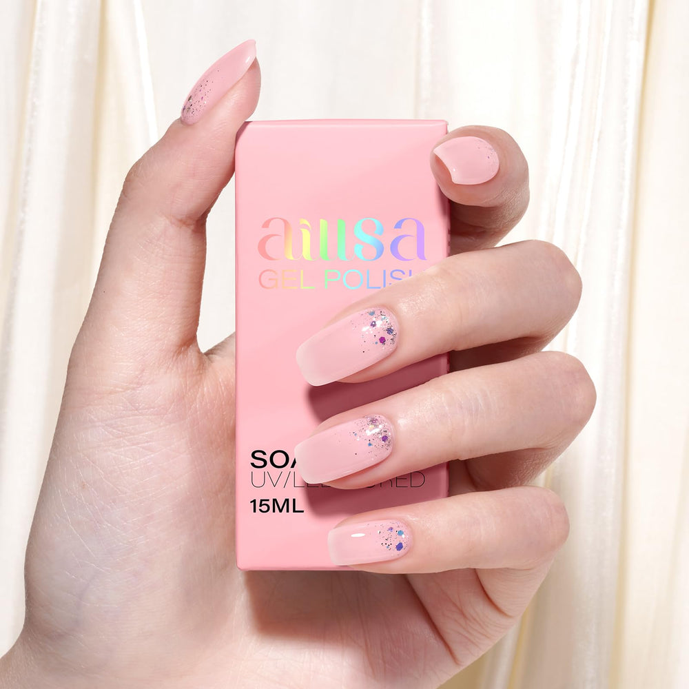 AILLSA milky-pink gel-nail-polish on nail shows layered depth.