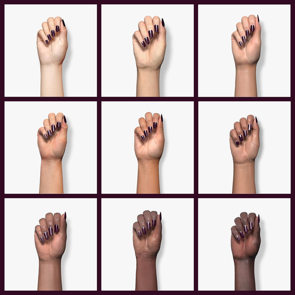 AIMEILI finished manicure with high-gloss burgundy plum shine.