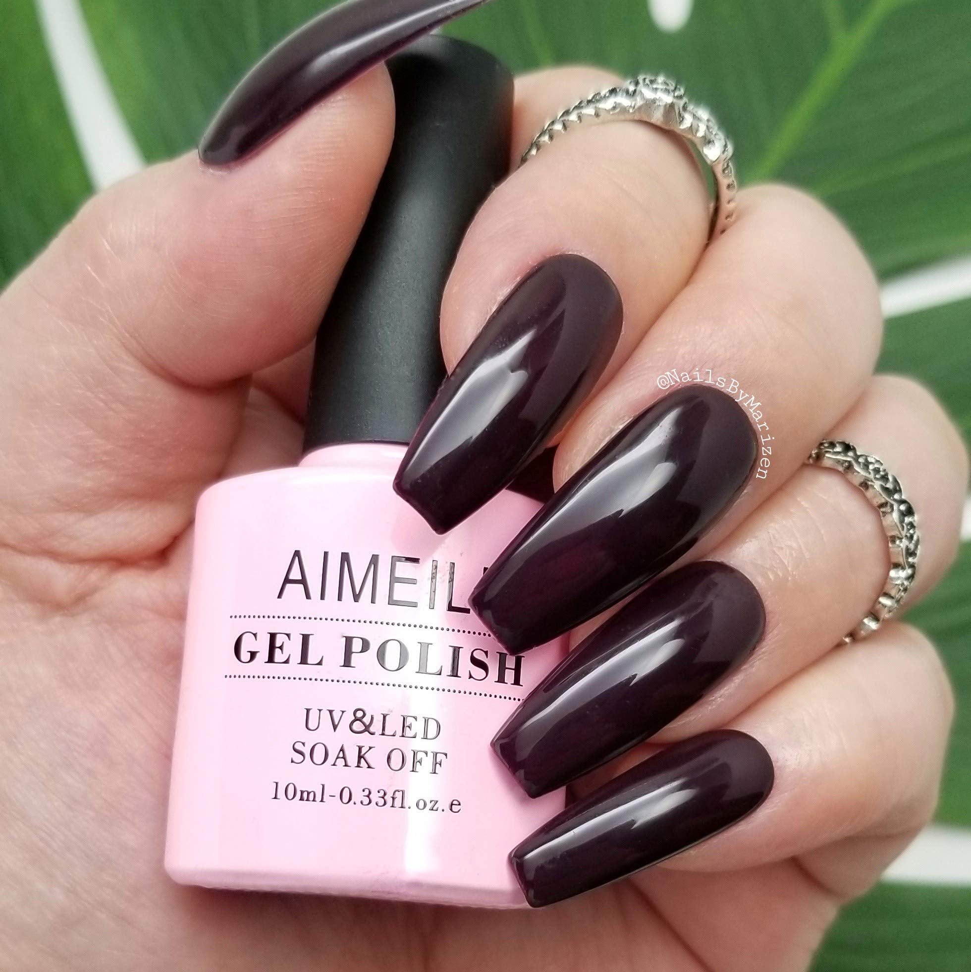 AIMEILI gel brush applying polish for smooth layers.