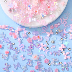 AIPULIDUO camellia rose resin charms in pink for timeless nail art accents.