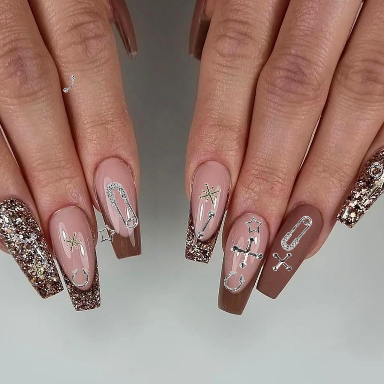 AIPULIDUO Y2K silver cross charms elevate fashion nails and accessories.