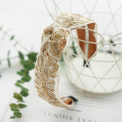 AK purple knotted headband for versatile outfits and easy styling