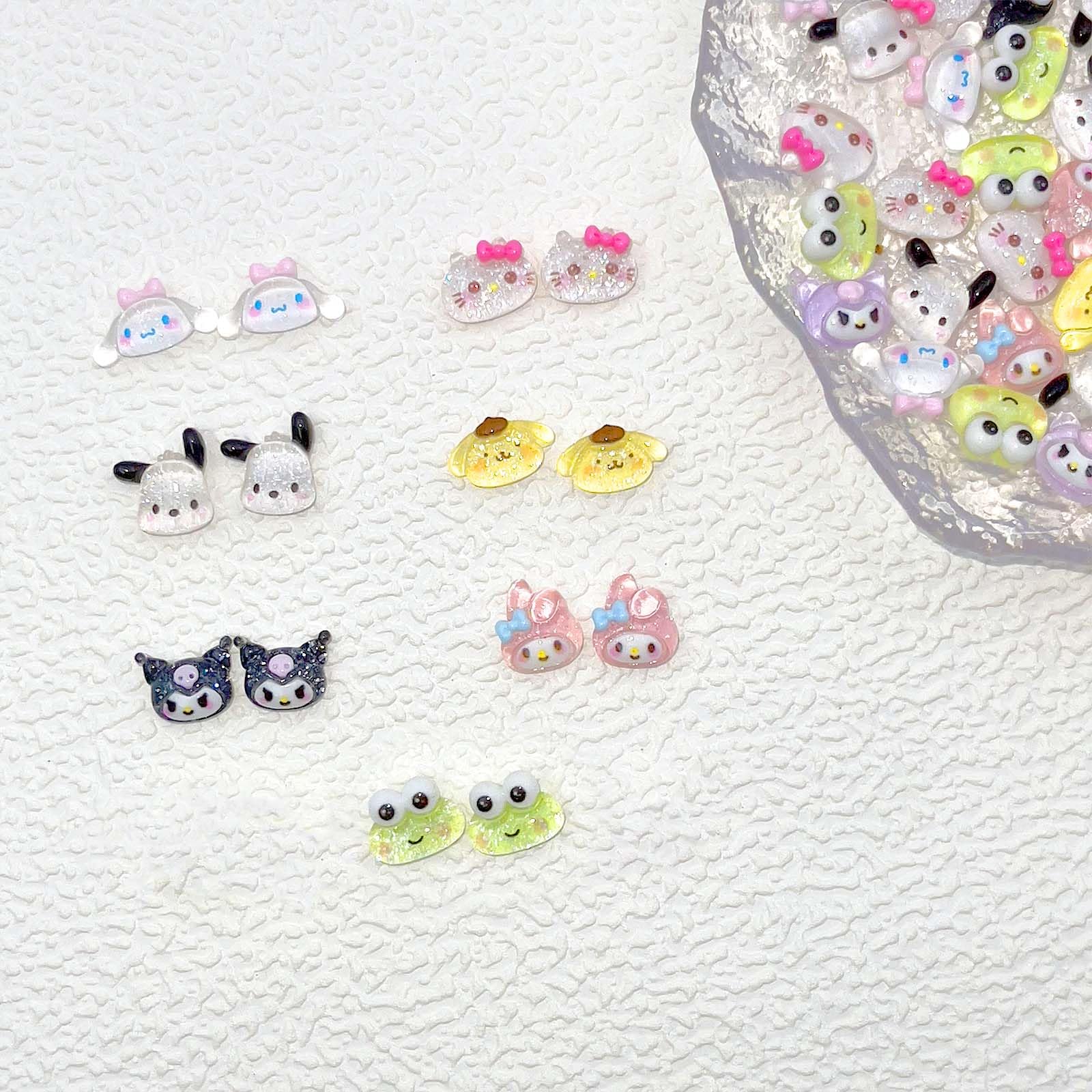 Akutoer 70Pcs Kawaii Nail Charms set with diverse designs for playful nails.