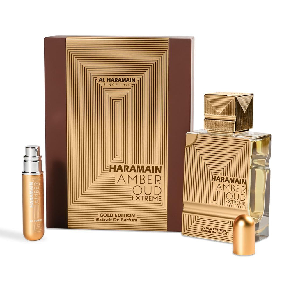 Al Haramain Amber Oud Gold Edition Extreme gift set packaging with elegant bottle and 10ml mini spray.