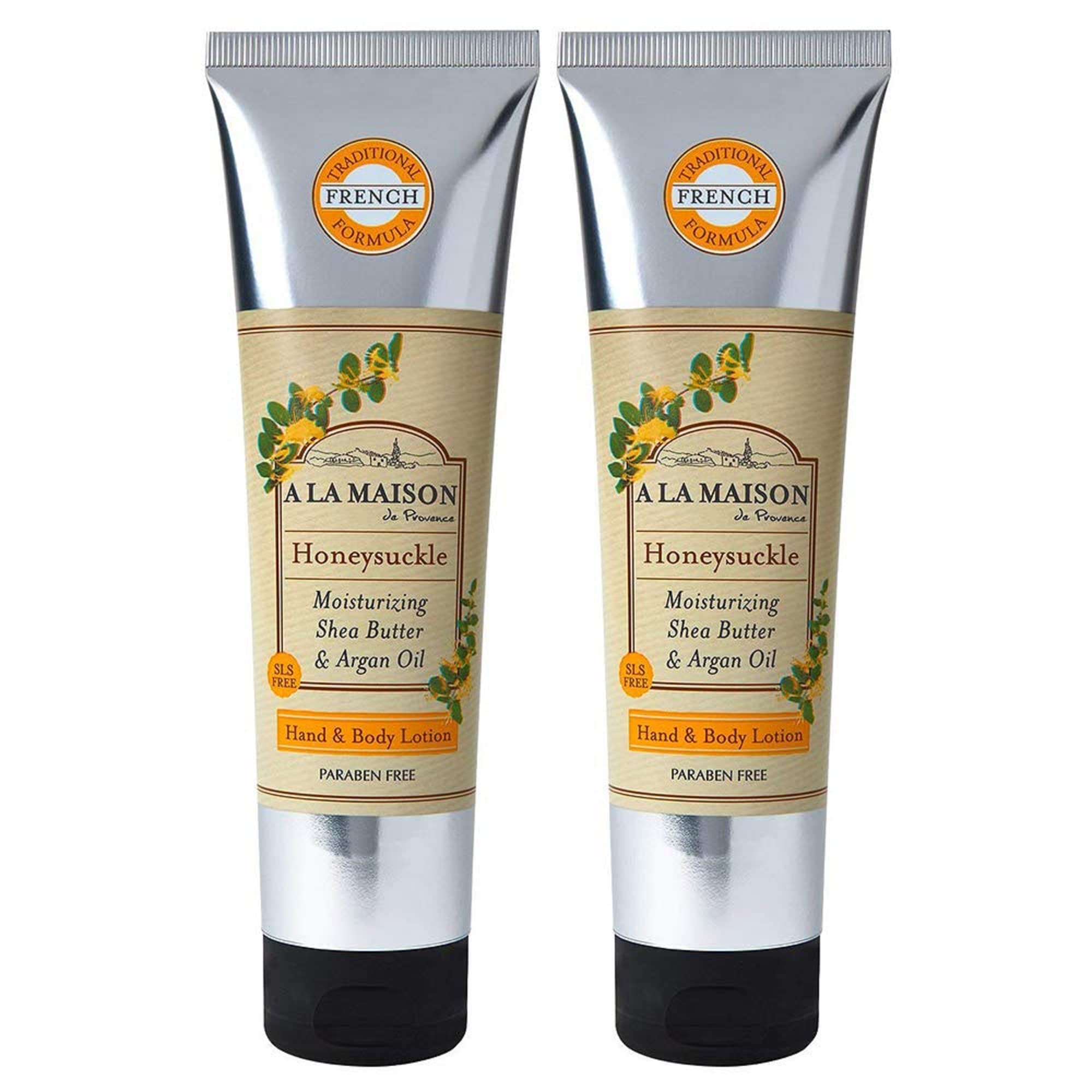 A LA MAISON honeysuckle lotion bottle for daily moisturization.